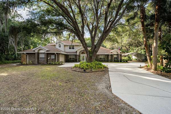 1.58 Acres of Residential Land with Home for Sale in Titusville, Florida