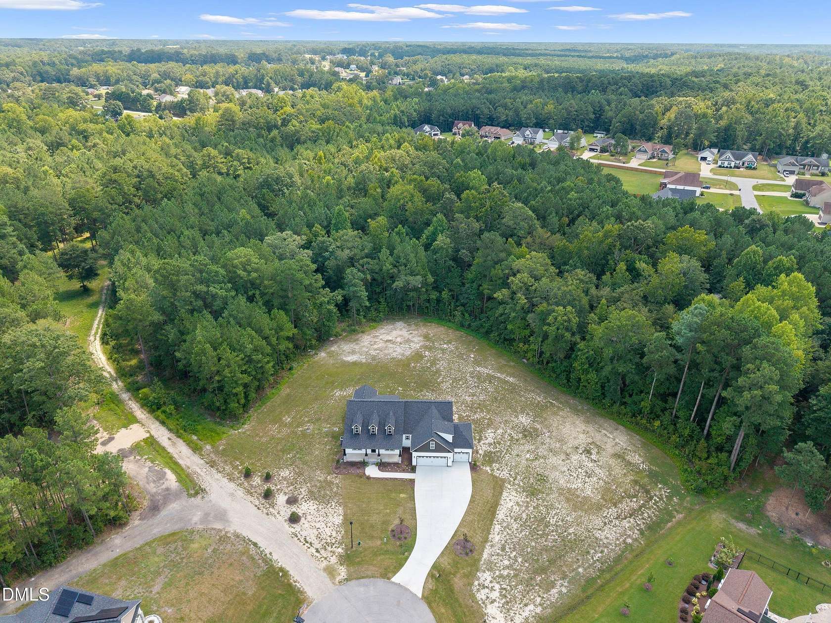 10.7 Acres of Land with Home for Sale in Clayton, North Carolina