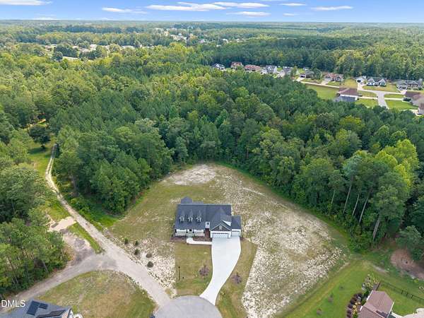 10.7 Acres of Land with Home for Sale in Clayton, North Carolina