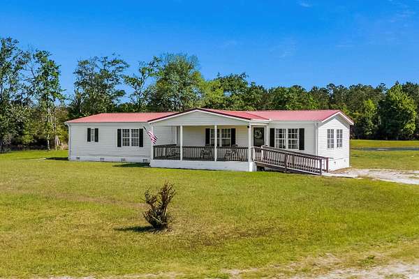 14.1 Acres of Land with Home for Sale in Loris, South Carolina