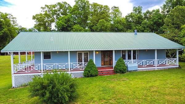 3.9 Acres of Residential Land with Home for Sale in Dandridge, Tennessee