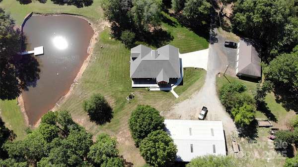 4.52 Acres of Residential Land with Home for Sale in Huntersville, North Carolina