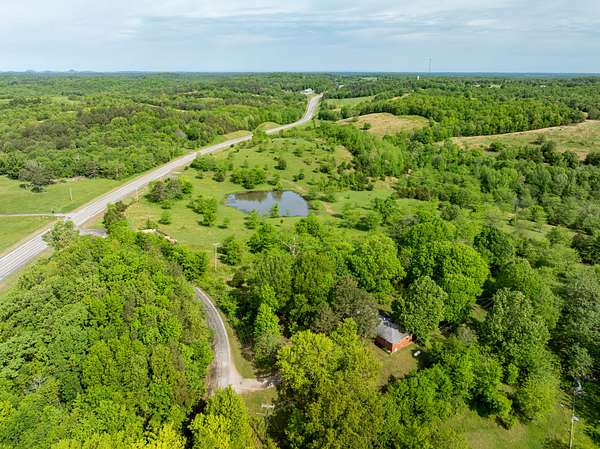 72 Acres of Agricultural Land with Home for Sale in Mount Pleasant, Arkansas