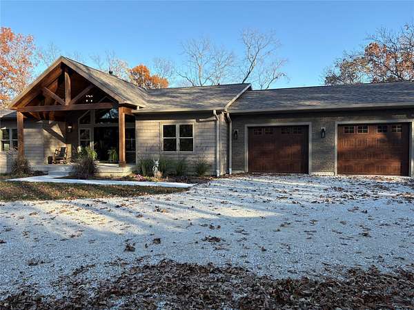 9 Acres of Residential Land with Home for Sale in Lucas, Iowa