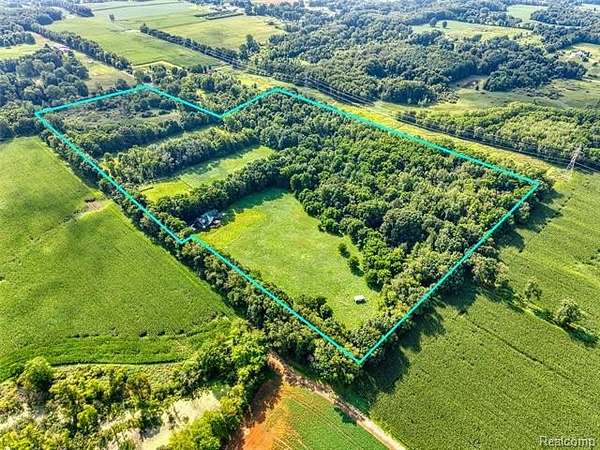 36 Acres of Land with Home for Sale in Leslie, Michigan