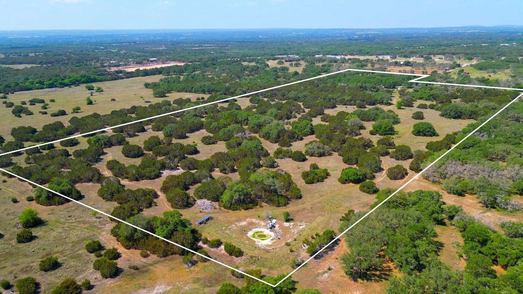 29.9 Acres of Agricultural Land with Home for Sale in Bertram, Texas