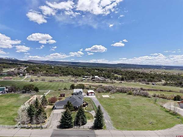 2.85 Acres of Residential Land with Home for Sale in Cedaredge, Colorado