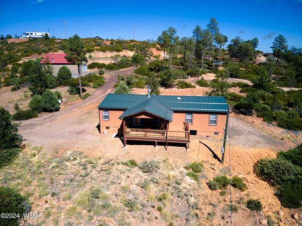 4.25 Acres of Residential Land with Home for Sale in Show Low, Arizona