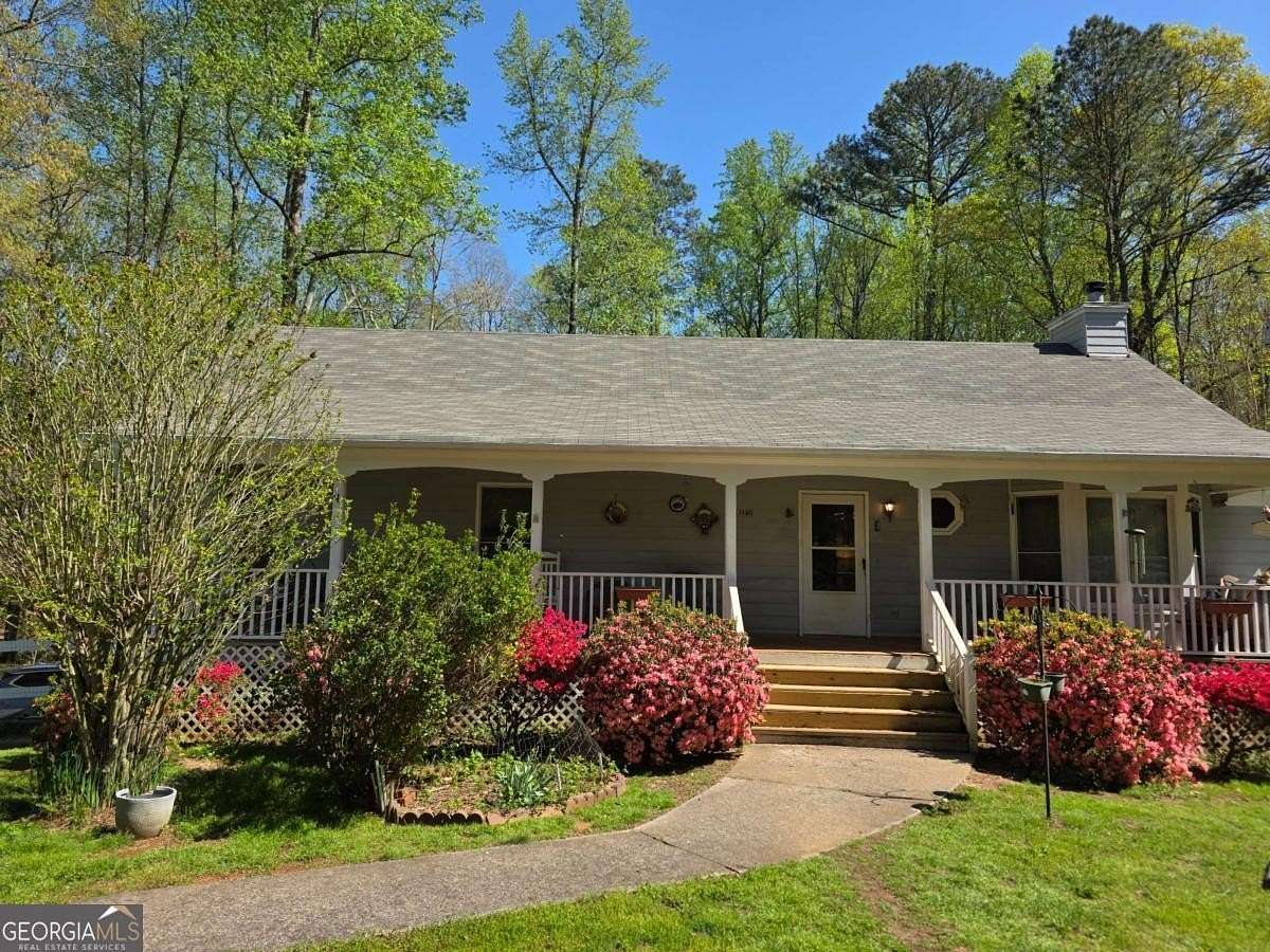 1.7 Acres of Residential Land with Home for Sale in Ball Ground, Georgia