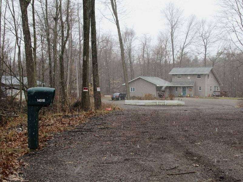 10.5 Acres of Land with Home for Sale in Otter Lake, Michigan