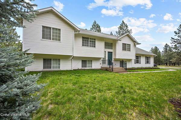 5 Acres of Residential Land with Home for Sale in Athol, Idaho