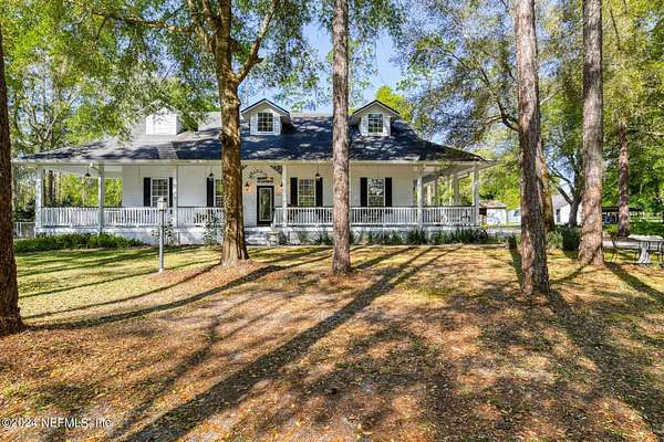 3.89 Acres of Residential Land with Home for Sale in Interlachen, Florida