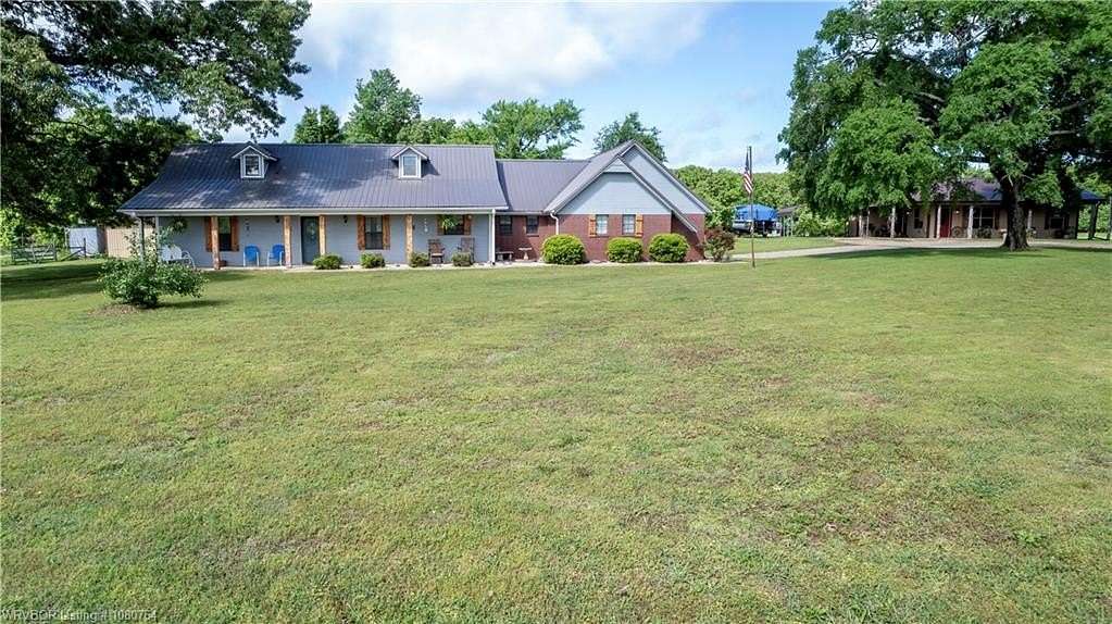 4.17 Acres of Residential Land with Home for Sale in Muldrow, Oklahoma