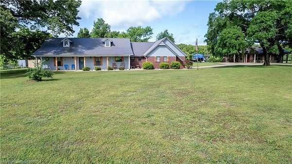 4.17 Acres of Residential Land with Home for Sale in Muldrow, Oklahoma