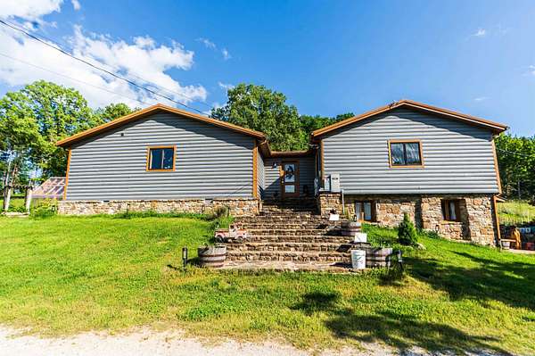 122 Acres of Recreational Land with Home for Sale in Yellville, Arkansas