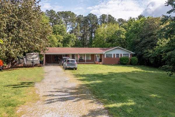 49.7 Acres of Land with Home for Sale in Rocky Face, Georgia