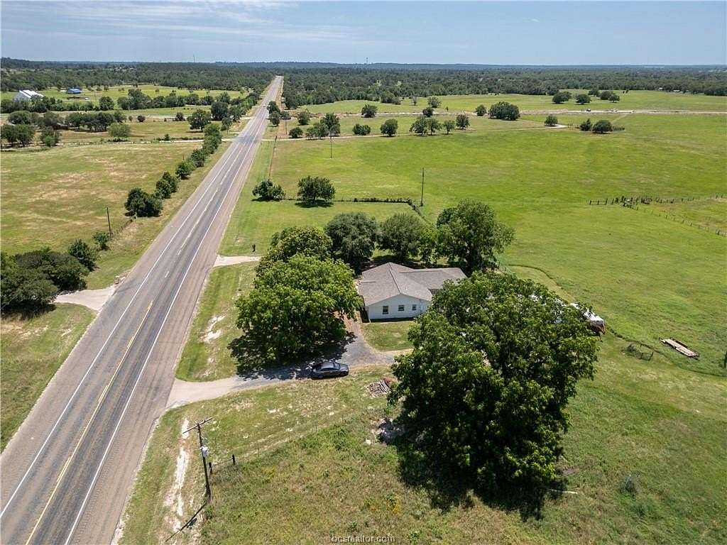 20 Acres of Agricultural Land with Home for Sale in Bedias, Texas
