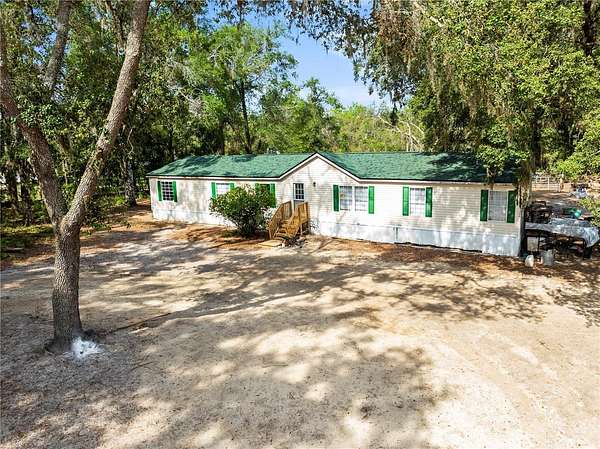 2 Acres of Residential Land with Home for Sale in Dade City, Florida