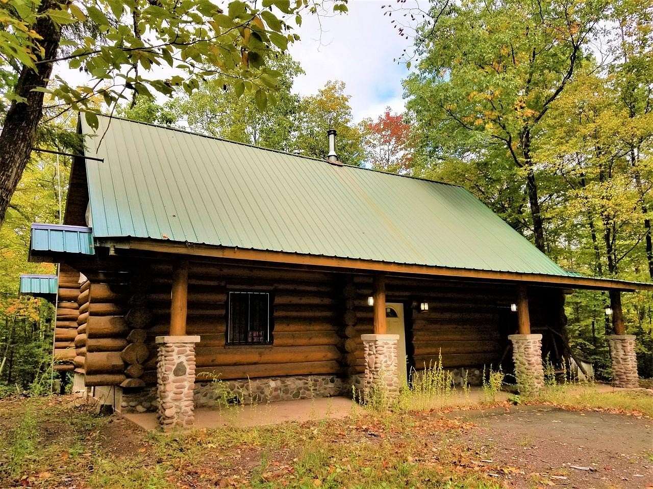 10 Acres of Residential Land with Home for Sale in Saxon, Wisconsin