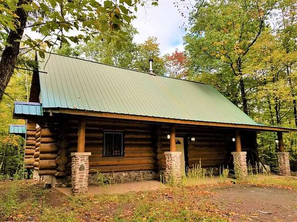 10 Acres of Residential Land with Home for Sale in Saxon, Wisconsin