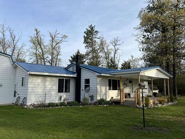 10 Acres of Residential Land with Home for Sale in Lewiston, Michigan