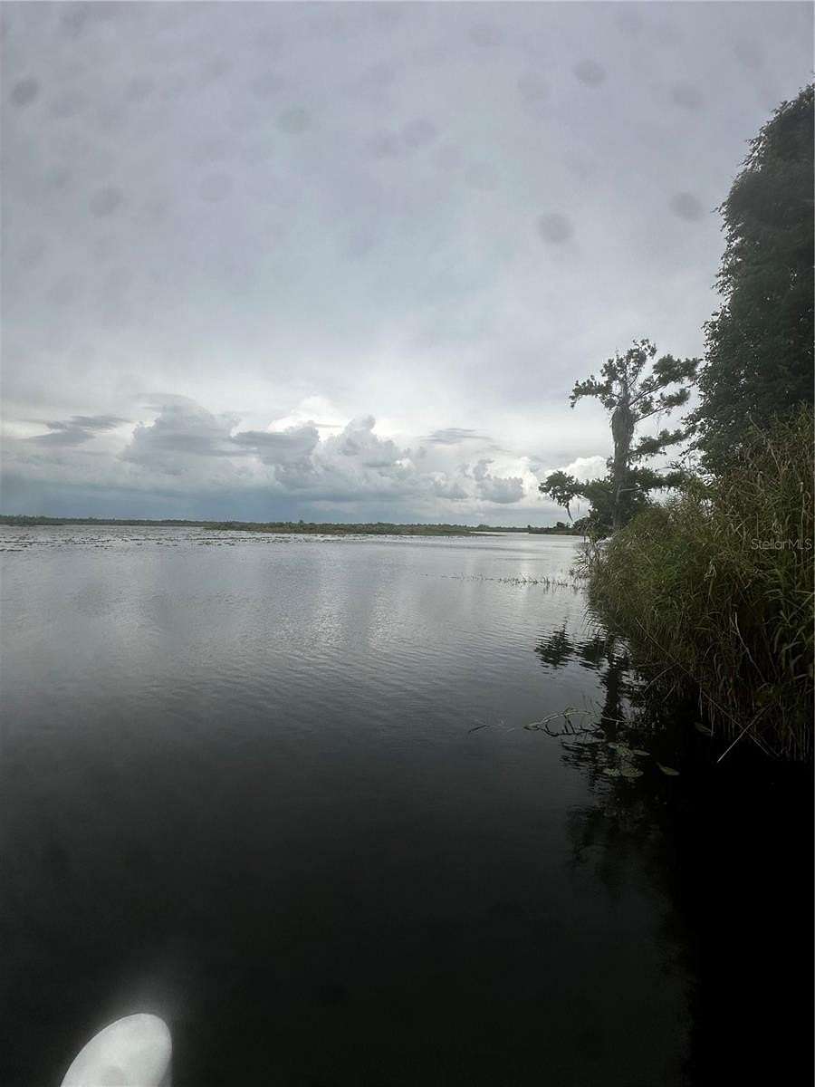 2.35 Acres of Residential Land with Home for Sale in Punta Gorda, Florida