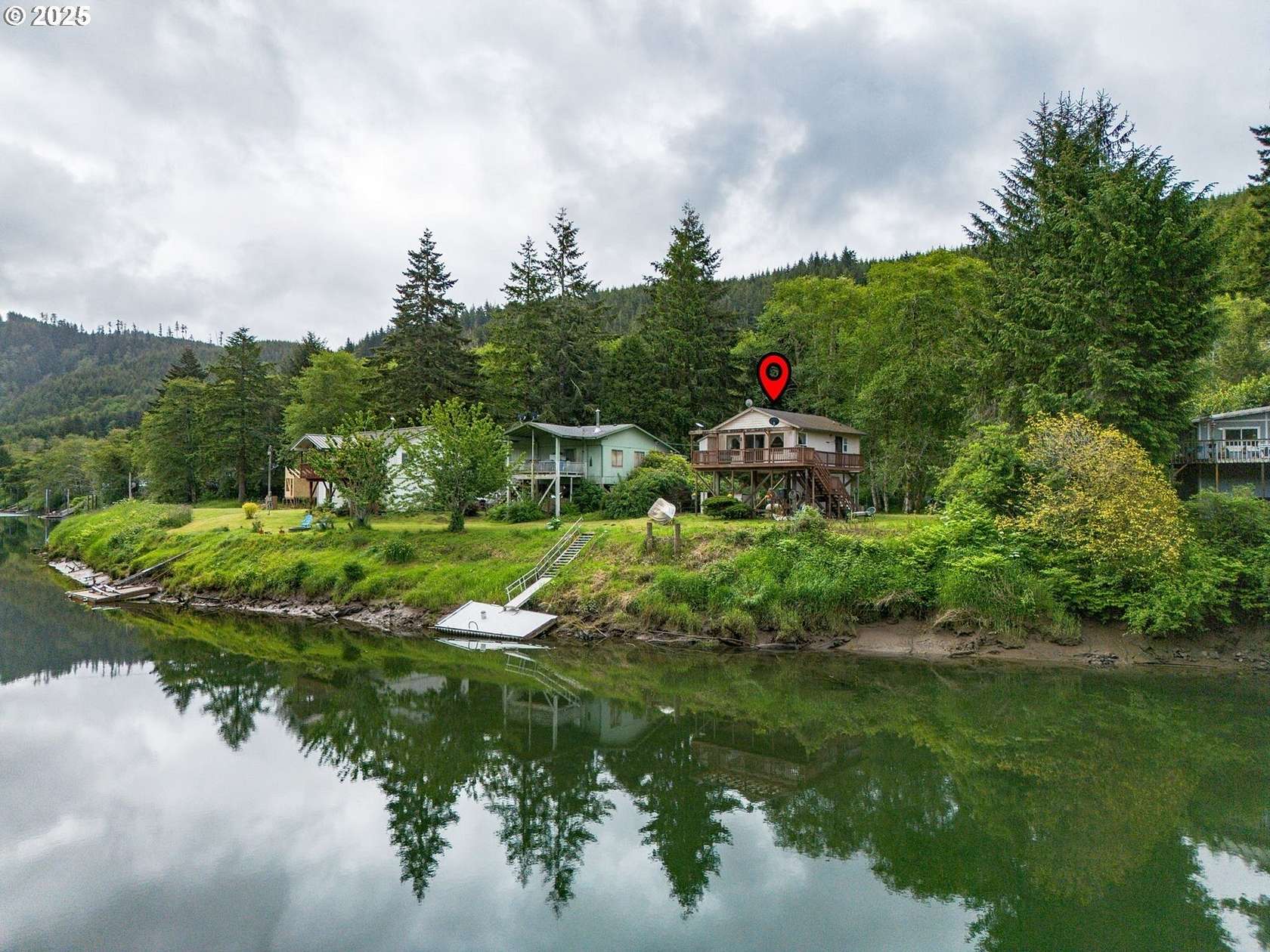 0.85 Acres of Residential Land with Home for Sale in Siletz, Oregon