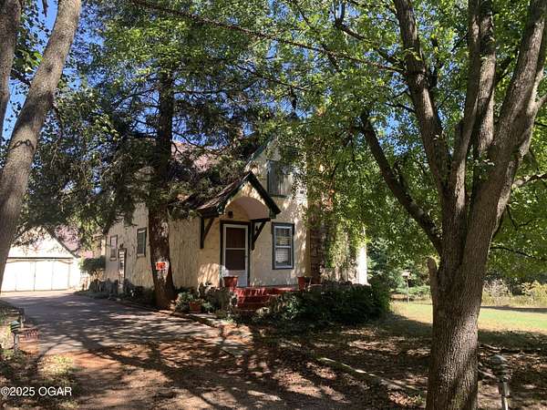 21 Acres of Land with Home for Sale in Joplin, Missouri