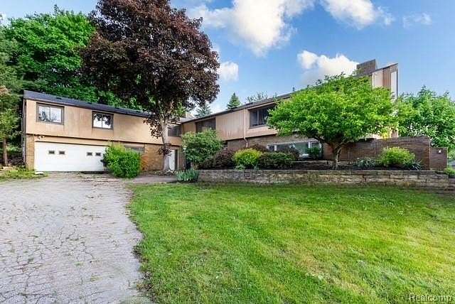 2.5 Acres of Residential Land with Home for Sale in Milford, Michigan