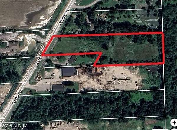 3.88 Acres of Commercial Land for Sale in Casco, Michigan
