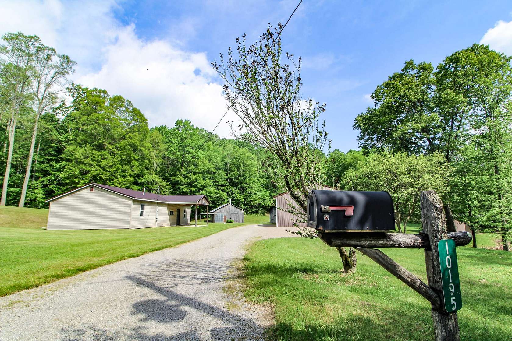 9.12 Acres of Land with Home for Sale in Roseville, Ohio