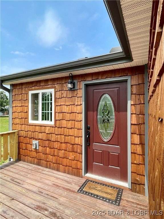 3.6 Acres of Residential Land with Home for Sale in Linn Creek, Missouri