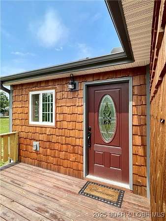 3.6 Acres of Residential Land with Home for Sale in Linn Creek, Missouri