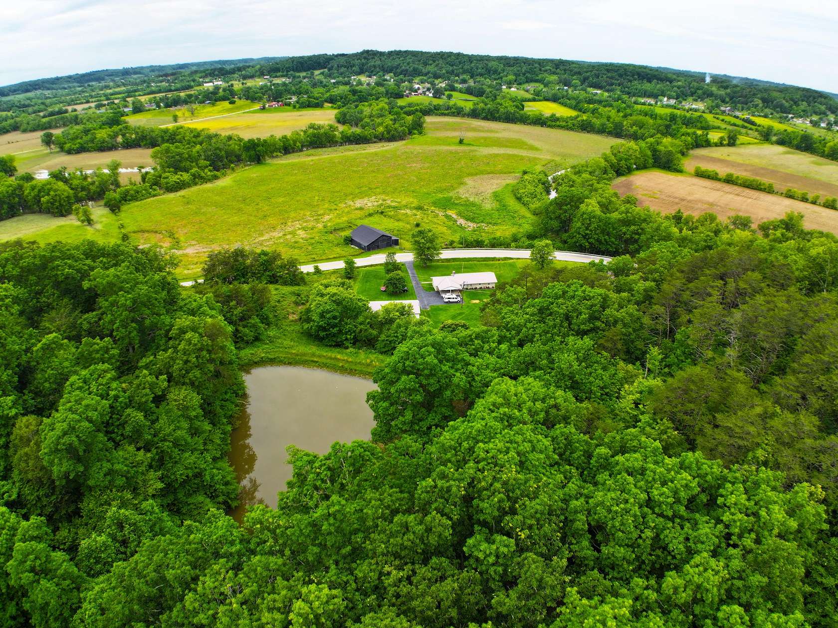 115 Acres of Land with Home for Sale in Irvine, Kentucky