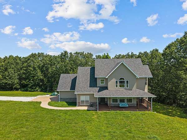10.2 Acres of Land with Home for Sale in Highlandville, Missouri