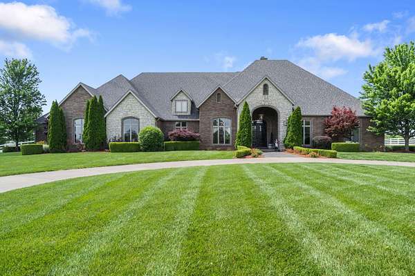 60 Acres of Agricultural Land with Home for Sale in Rogersville, Missouri