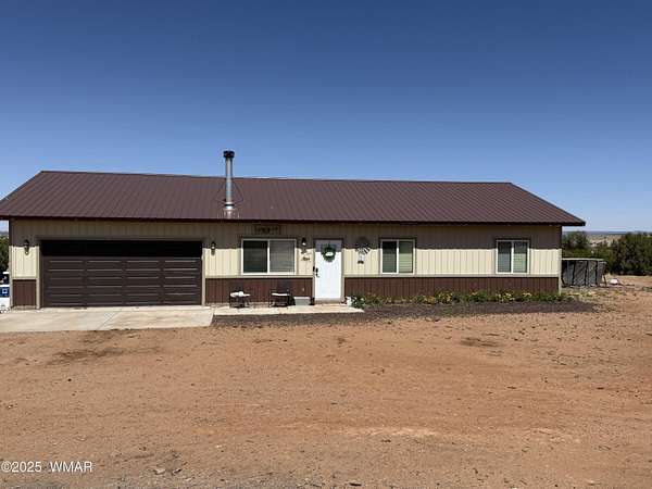 5 Acres of Residential Land with Home for Sale in Snowflake, Arizona