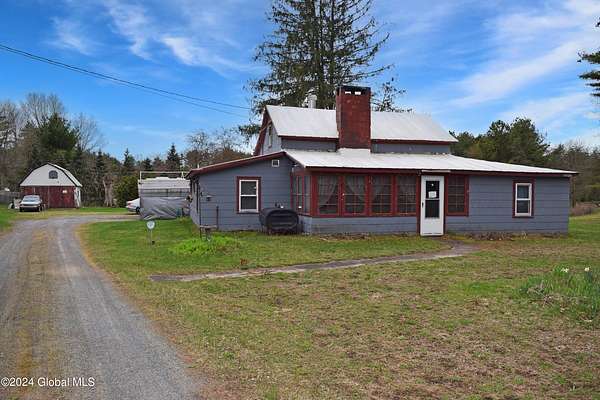 1.19 Acres of Land with Home for Sale in Moreau Town, New York