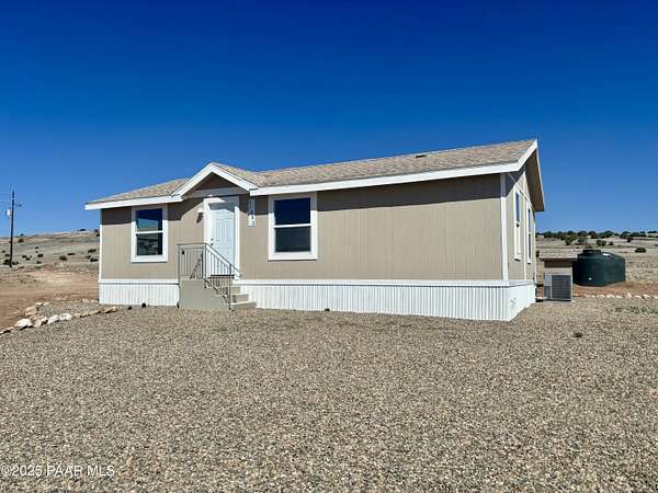 6.52 Acres of Residential Land with Home for Sale in Seligman, Arizona