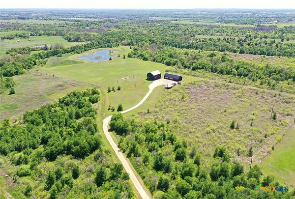 51 Acres of Recreational Land with Home for Sale in Elgin, Texas