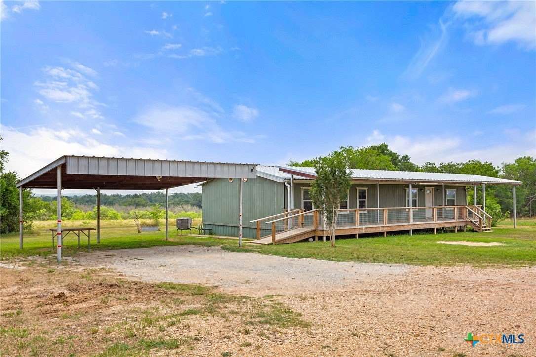 10 Acres of Land with Home for Sale in Red Rock, Texas