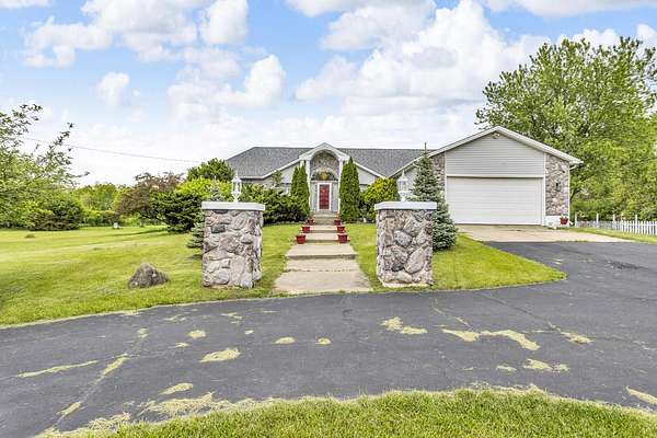 5 Acres of Residential Land with Home for Sale in Horton, Michigan