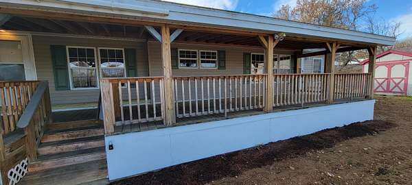 6 Acres of Residential Land with Home for Sale in Patten, Maine