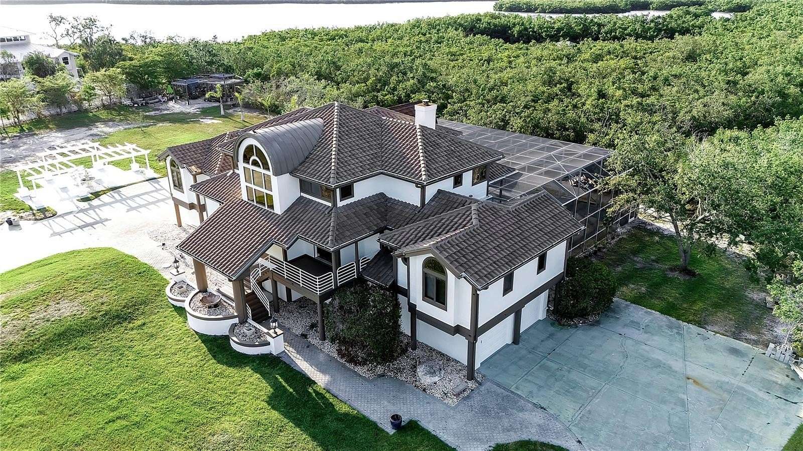 4.9 Acres of Residential Land with Home for Sale in Terra Ceia, Florida