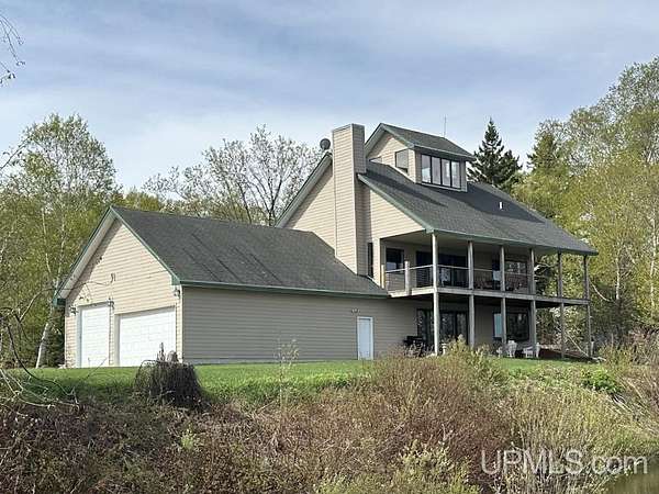 5 Acres of Residential Land with Home for Sale in Grand Marais, Michigan