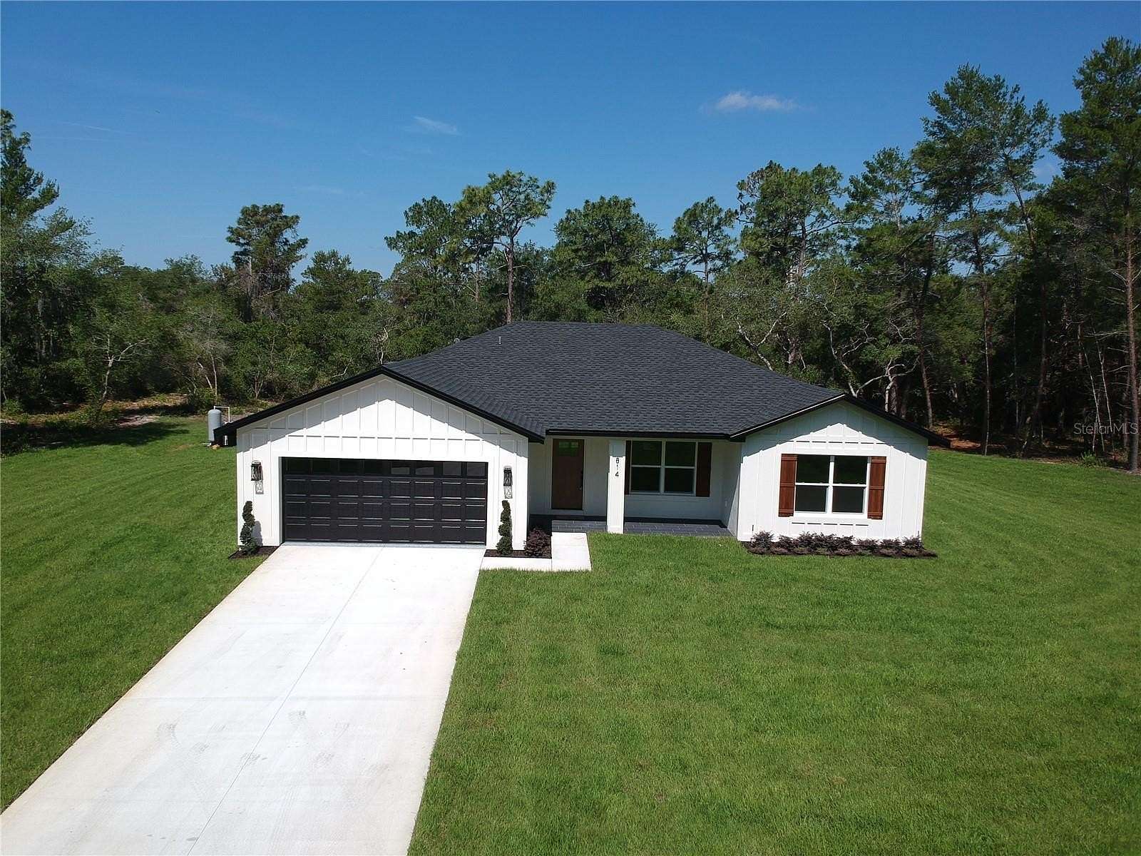 2.5 Acres of Residential Land with Home for Sale in Deltona, Florida