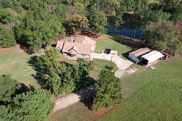 22.4 Acres of Land with Home for Sale in Annona, Texas