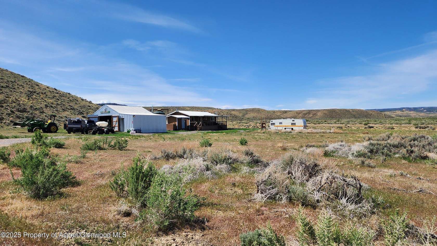 27.7 Acres of Recreational Land with Home for Sale in Maybell, Colorado