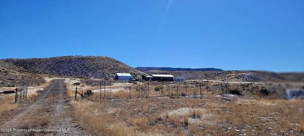 27.7 Acres of Recreational Land with Home for Sale in Maybell, Colorado