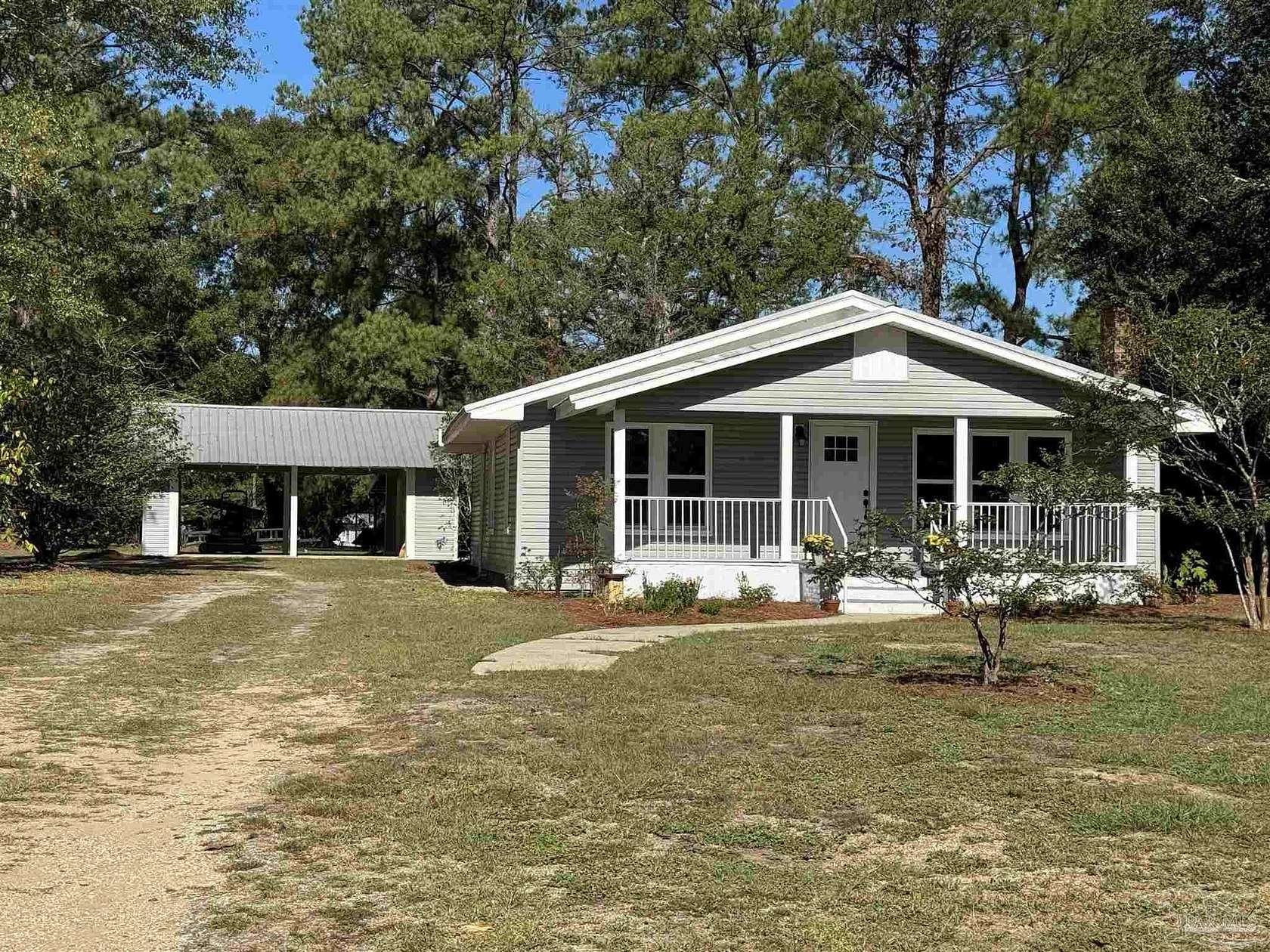 5.35 Acres of Residential Land with Home for Sale in Century, Florida